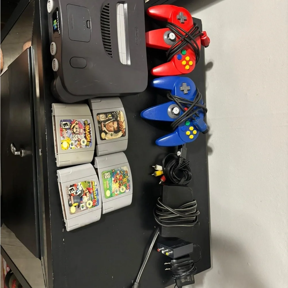 Nintendo Gray Console with Controllers and Game Cartridges